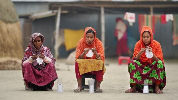 View of three women doing handcrafts Bangladesh. View of three women doing handcrafts Bangladesh.