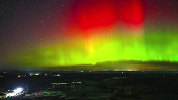 Aerial view of aurora borealis over the landscape of Latvia. Aerial view of aurora borealis over the landscape of Latvia.