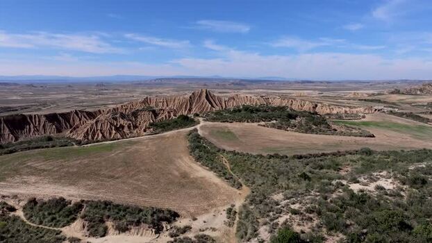 Aerial view of Bardenas Reales desert landscape in Spain.