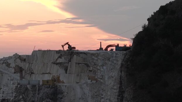 Aerial view of Carrara marble quarry at sunset Italy. Aerial view of Carrara marble quarry at sunset Italy.