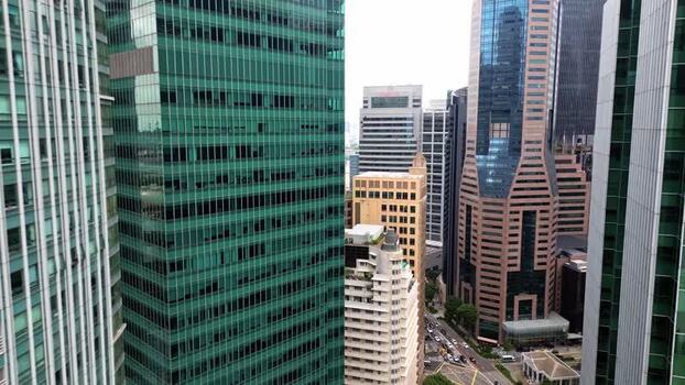 Aerial view of skyscrapers in downtown Singapore. Aerial view of skyscrapers in downtown Singapore.