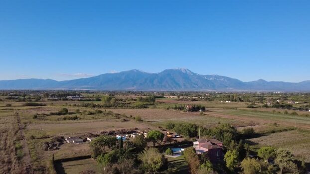Aerial view of Mount Olympus and fields in Paralia Katerinis Greece.