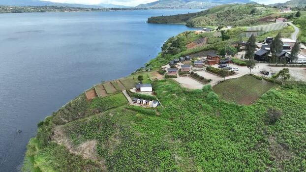 Aerial view of Alahan Panjang resort by the lake Indonesia. Aerial view of Alahan Panjang resort by the lake Indonesia.