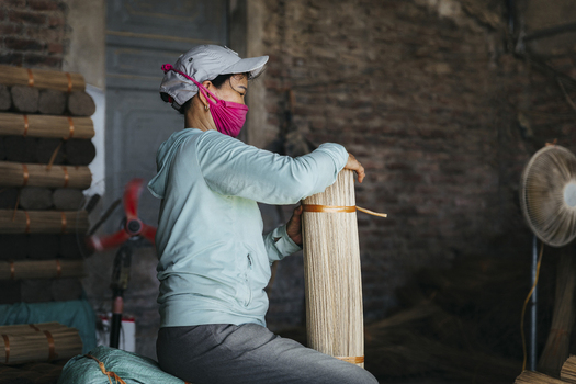 Ung Hoa Vietnam 23 July 2023 View of a woman working with incense in a traditional artisanal village Quang Phu Cau Ung Hoa Hanoi Vietnam.