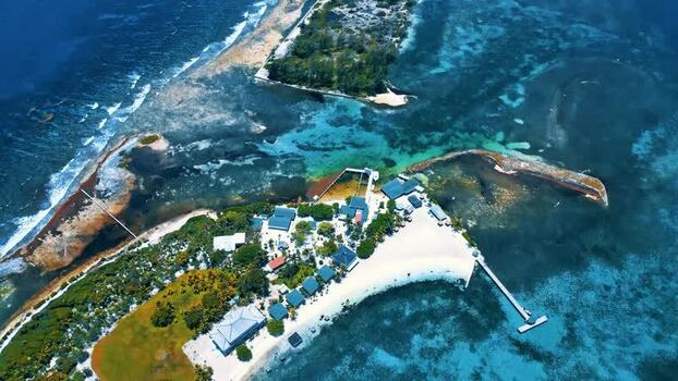 Aerial view of the tropical shores and coral reefs of Guanaja Honduras. Aerial view of the tropical shores and coral reefs of Guanaja Honduras.