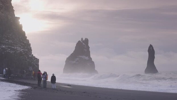 View of Reynisdrangar sea stacks on black sand beach Iceland. View of Reynisdrangar sea stacks on black sand beach Iceland.
