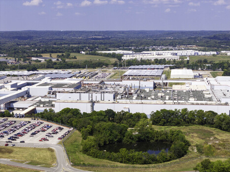 Aerial view of the General Motors Spring Hill Manufacturing Plant showing industrial buildings HVAC units ventilation systems parking lots and green landscape in Nashville TN United States. Aerial view of the General Motors Spring Hill Manufacturing Plant showing industrial buildings HVAC units ventilation systems parking lots and green landscape in Nashville TN United States.