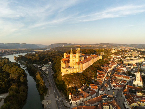 Aerial view of the historic Melk Abbey perched on a cliff overlooking the Danube river and the town of Melk Niederosterreich Austria. Aerial view of the historic Melk Abbey perched on a cliff overlooking the Danube river and the town of Melk Niederosterreich Austria.