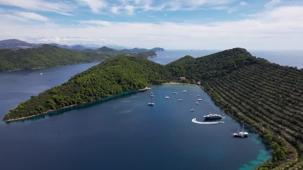 Aerial view of wooded Elaphiti islands and boats Dalmatian Coast Croatia.