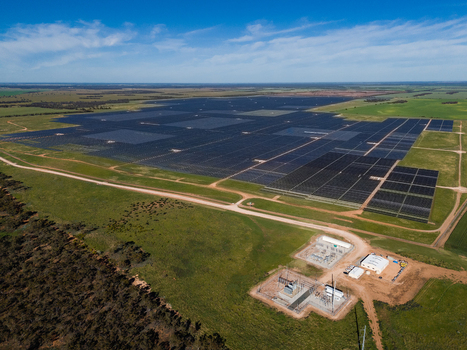 Aerial view of Limondale Solar Farm with extensive rows of photovoltaic panels in a rural landscape with green fields and an electrical substation in Balranald New South Wales Australia. Aerial view of Limondale Solar Farm with extensive rows of photovoltaic panels in a rural landscape with green fields and an electrical substation in Balranald New South Wales Australia.