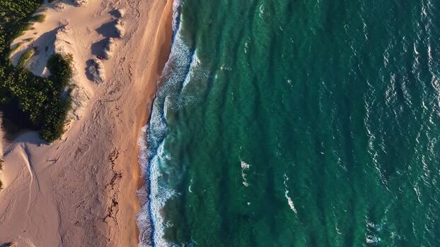 Aerial view of the turquoise sea and sandy beach in Costa Paradiso Italy. Aerial view of the turquoise sea and sandy beach in Costa Paradiso Italy.