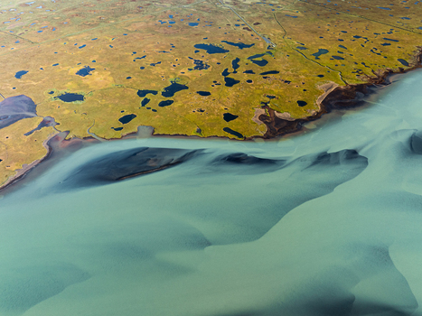 Aerial view of glacial rivers carving through the landscape a tapestry of turquoise waters against the ochre earth Iceland Iceland. Aerial view of glacial rivers carving through the landscape a tapestry of turquoise waters against the ochre earth Iceland Iceland.