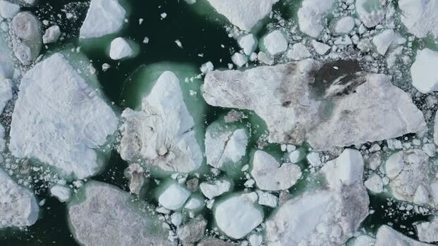 Aerial view of icebergs in Ilulissat Greenland. Aerial view of icebergs in Ilulissat Greenland.