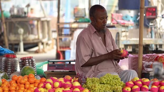 View of a fruit vendor at a local market in Bogura Bangladesh.