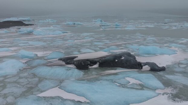 Aerial view of icebergs floating in Fjallsarlon lagoon Iceland. Aerial view of icebergs floating in Fjallsarlon lagoon Iceland.