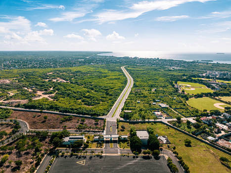 Aerial view of the Base de Infanteria de Marina Valm Manuel Ramon Montes Arache with green vegetation a road and baseball fields in Boca Chica Santo Domingo Dominican Republic. Aerial view of the Base de Infanteria de Marina Valm Manuel Ramon Montes Arache with green vegetation a road and baseball fields in Boca Chica Santo Domingo Dominican Republic.