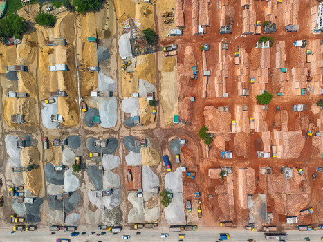 Aerial view of piles of sand and bricks creating a textured mosaic of earthy tones and geometric shapes Dhaka Dhaka Division Bangladesh. Aerial view of piles of sand and bricks creating a textured mosaic of earthy tones and geometric shapes Dhaka Dhaka Division Bangladesh.