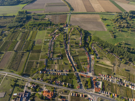 Aerial view of Hajos pincefalu a historic wine cellar village with rows of traditional small buildings nestled among vineyards and agricultural fields in Hajos Hungary. Aerial view of Hajos pincefalu a historic wine cellar village with rows of traditional small buildings nestled among vineyards and agricultural fields in Hajos Hungary.