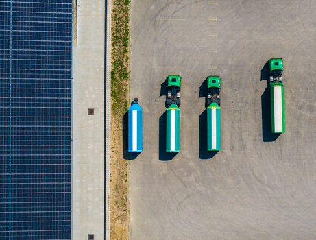 Aerial view of Hombourg Logistic park with parked semi trucks and solar panels in Hombourg Grand Est France.