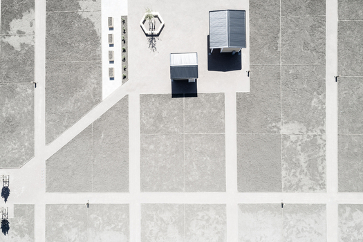 Aerial view of Gardstensberget park featuring geometric pathways small modern structures and minimalist landscaping in Gothenburg Vastra Gotaland County Sweden. Aerial view of Gardstensberget park featuring geometric pathways small modern structures and minimalist landscaping in Gothenburg Vastra Gotaland County Sweden.