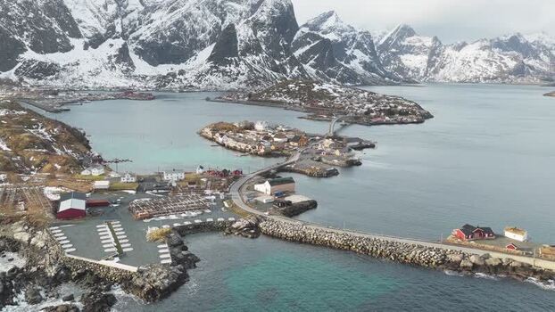 Aerial view of Hamn&oslash;y with snow capped mountains Norway.