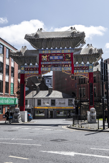Newcastle upon Tyne United Kingdom 13 July 2026 View of the ornate Chinese ceremonial gate in Chinatown with traditional architectural details and stone guardian lions. Newcastle upon Tyne United Kingdom 13 July 2026 View of the ornate Chinese ceremonial gate in Chinatown with traditional architectural details and stone guardian lions.