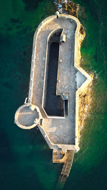 Aerial view of the Château du Taureau stands as a stone sentinel amidst the turquoise waters a testament to Breton resilience Plouezoc h Bretagne France. Aerial view of the Château du Taureau stands as a stone sentinel amidst the turquoise waters a testament to Breton resilience Plouezoc h Bretagne France.