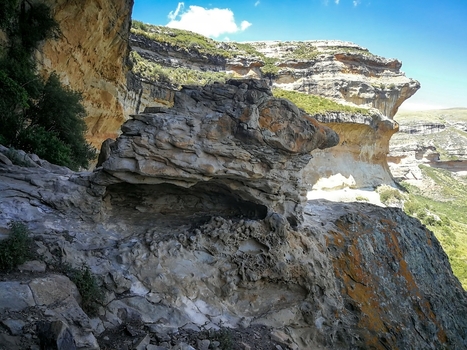 View of the dramatic sandstone cliffs and rugged rock formations at Golden Gate Highlands National Park in Clarens Free State South Africa. View of the dramatic sandstone cliffs and rugged rock formations at Golden Gate Highlands National Park in Clarens Free State South Africa.