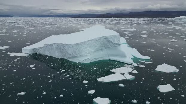 Aerial view of large iceberg in Ilulissat Greenland. Aerial view of large iceberg in Ilulissat Greenland.