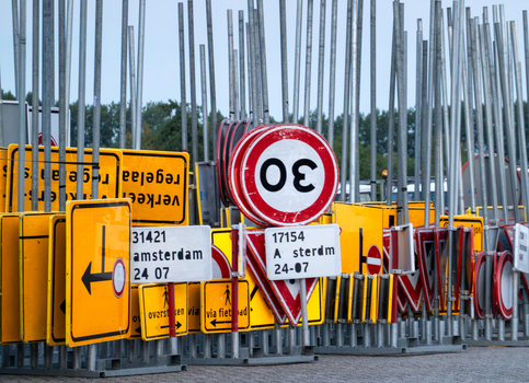 View of a collection of various traffic signs including speed limit signs and directional signs stored in a depot in Zaandam North Holland Netherlands.