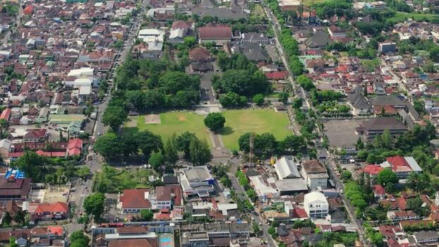 Aerial view of Dieng Plateau town and green square Indonesia. Aerial view of Dieng Plateau town and green square Indonesia.