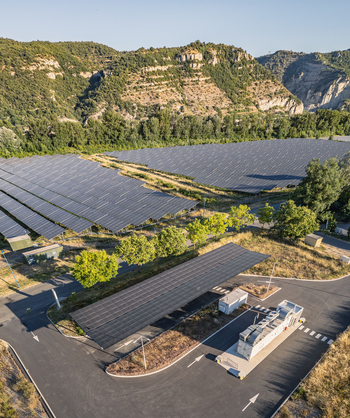Aerial view of a battery energy storage system integrated with a solar photovoltaic carport supporting renewable energy infrastructure in Le Pouzin Auvergne Rhone Alpes France. Aerial view of a battery energy storage system integrated with a solar photovoltaic carport supporting renewable energy infrastructure in Le Pouzin Auvergne Rhone Alpes France.