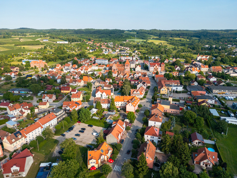 Aerial view of the town of Tolkmicko with its historic red roofed buildings narrow streets and surrounding green landscape in Tolkmicko Warmian Masurian Voivodeship Poland.