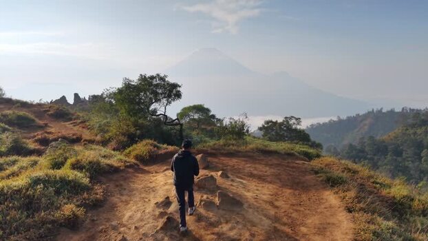 Aerial view of Golden Sunrise Sikunir mountain landscape Indonesia. Aerial view of Golden Sunrise Sikunir mountain landscape Indonesia.