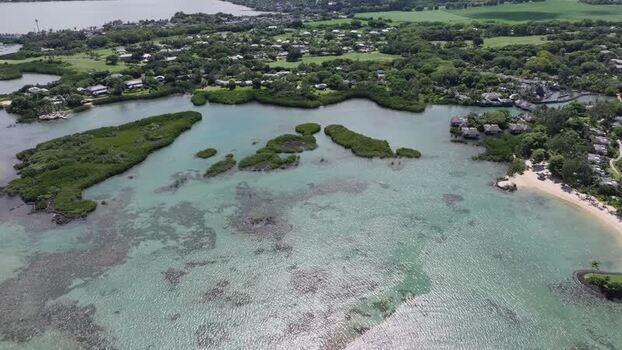 Aerial view of the turquoise lagoon at Ile aux Cerfs Mauritius.