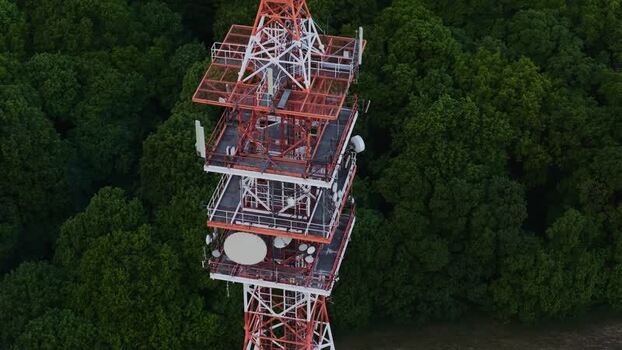 Aerial view of a telecommunications tower in a forest Czechia. Aerial view of a telecommunications tower in a forest Czechia.