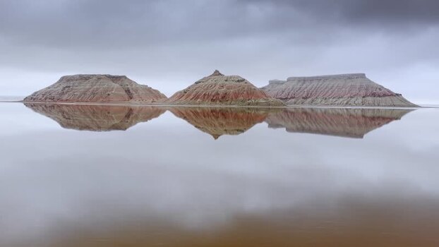 Aerial view of Karynzharyk rock formations reflected in Kazakhstan.