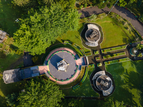 Purwokerto Indonesia 08 May 2026 Aerial view of the National Monument of Jendral Soedirman featuring circular stone platforms and lush green gardens surrounded by trees. Purwokerto Indonesia 08 May 2026 Aerial view of the National Monument of Jendral Soedirman featuring circular stone platforms and lush green gardens surrounded by trees.