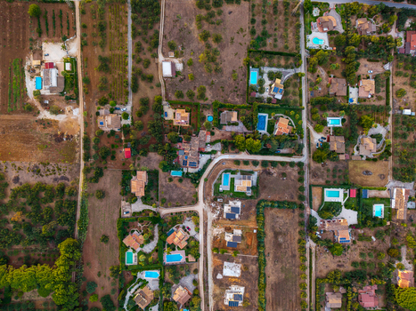 Aerial view of residential houses with swimming pools surrounded by agricultural fields and olive groves in Palermo Sicily Italy. Aerial view of residential houses with swimming pools surrounded by agricultural fields and olive groves in Palermo Sicily Italy.