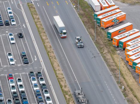 Grunheide Mark Brandenburg Germany 07 September 2026 Aerial view of Tesla Gigafactory Berlin Brandenburg with rows of parked cars and semi trucks in a logistics yard. Grunheide Mark Brandenburg Germany 07 September 2026 Aerial view of Tesla Gigafactory Berlin Brandenburg with rows of parked cars and semi trucks in a logistics yard.