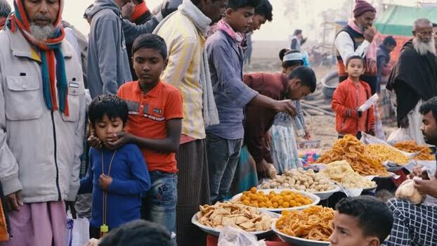 View of people at a street food market in Bogura Bangladesh. View of people at a street food market in Bogura Bangladesh.