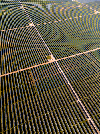 Aerial view of Limondale Solar Farm with rows of photovoltaic panels stretching across the landscape in Balranald New South Wales Australia. Aerial view of Limondale Solar Farm with rows of photovoltaic panels stretching across the landscape in Balranald New South Wales Australia.