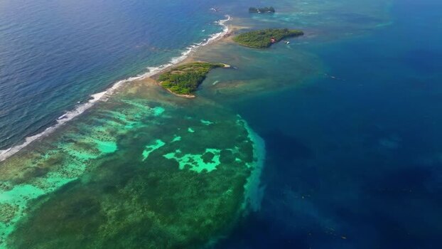 Aerial view of the lush tropical islands and vibrant coral reefs Honduras. Aerial view of the lush tropical islands and vibrant coral reefs Honduras.