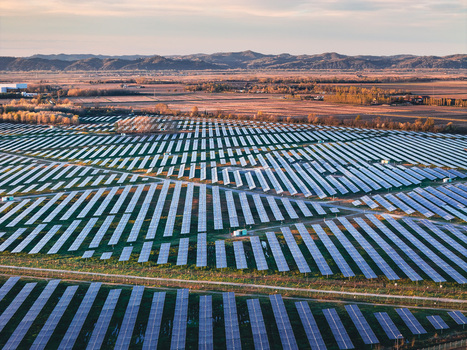 Trino Italy 30 March 2026 Aerial view of a vast solar farm stretching across the landscape panels gleaming under the warm sunlight contrasting with the golden hues of the distant fields. Trino Italy 30 March 2026 Aerial view of a vast solar farm stretching across the landscape panels gleaming under the warm sunlight contrasting with the golden hues of the distant fields.