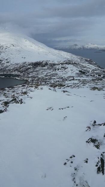 Aerial view of Kvaloya mountain ridge and fjord Norway.