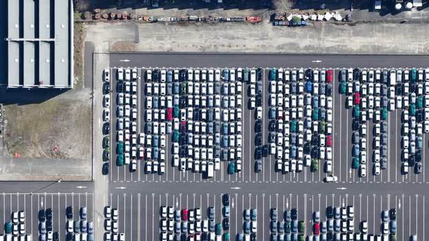 Aerial view of parking lot with cars France.
