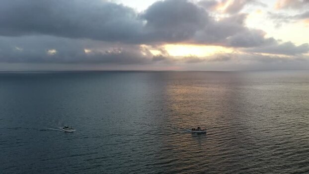 Aerial view of boats sailing on the ocean in South Africa.