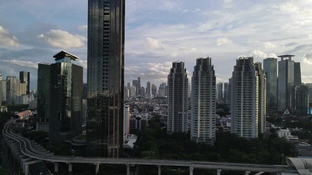 Aerial view of the modern skyline and skyscrapers in Indonesia. Aerial view of the modern skyline and skyscrapers in Indonesia.