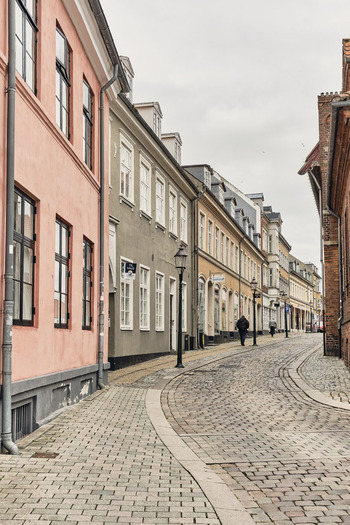 Viborg Denmark 07 August 2026 View of St Sct Hans Gade near Nytorv Square with historic colorful buildings and cobblestone street. Viborg Denmark 07 August 2026 View of St Sct Hans Gade near Nytorv Square with historic colorful buildings and cobblestone street.