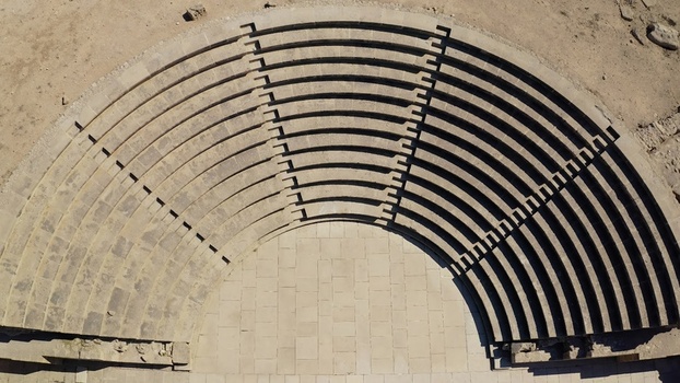 Aerial view of the ancient Roman amphitheater of Kourion with its stone seating tiers and orchestra area Kourion Limassol Cyprus. Aerial view of the ancient Roman amphitheater of Kourion with its stone seating tiers and orchestra area Kourion Limassol Cyprus.
